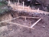 Marking out the rain water tank in the north eastern corner of the site