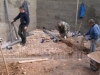 The \'plumbist\' laying the sewage pipes before the floor is laid