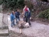 Trying to roll the rock off the road - hard work