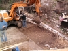 Bagger digging out the rain water tank, now on the eastern side not at he northeast corner as originally thought