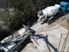2013-03-22-10h03; Day54; Concrete truck backing up to pump